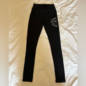 Gymshark women’s Black Athleisure Leggings with White Logo Size Small